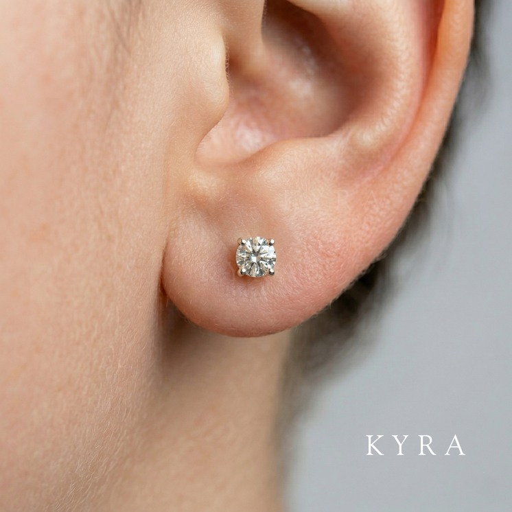 Classic Round CZ Ear Studs with Safety backs on adult ear-lobe