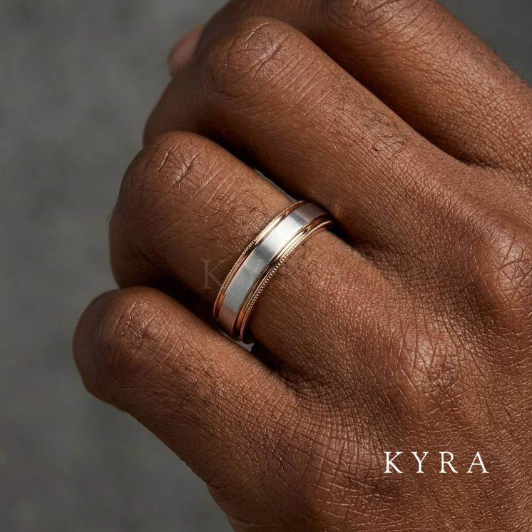 Two Tone matt 18K White and Rose Gold Wedding Band w/miligrain Edge on dark skinned hand by KYRA.ae