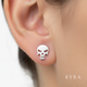 Golden Skull Threaded Stud in 18K Solid Gold on adult ear-lobe