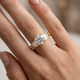 Round Brilliant & Baguette Three-Stone Ring on the hand