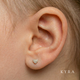 3mm Natural Diamond Heart Cluster Ear Stud in 14K White Gold on child's earlobe