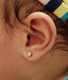 4mm CZ Square set in Solid White Gold on baby's ear
