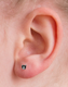 7mm White and Black Cat Ear Stud in Medical Grade Surgical Steel on ear