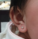 4mm Crystal Bezel Ear Stud Rose Gold 14k on baby's ear