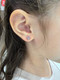 Surgical Steel Butterfly Glitter Pink Enamel Ear Stud on ear