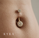Macro photo of 14K Solid Yellow Gold Belly Jewelry w/ CZ Pave Ball on the navel