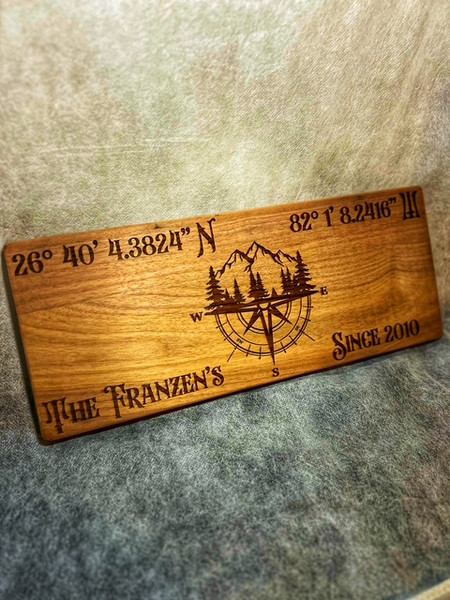 Discover the perfect blend of rustic charm and modern elegance with our Personalized Laser Engraved Wooden Coordinate Compass Sign. Crafted from premium North American maple, cherry, or walnut, this 6" x 15" x 3/4" wooden board features custom laser-engraved latitude and longitude coordinates from your chosen address, showcasing a sophisticated touch. The centerpiece boasts a stunning compass design, enhanced with optional wilderness motifs like pine trees, mountains, or forest accents, symbolizing adventure and exploration. Personalize it further with your family name and a significant date—ideal for weddings, anniversaries, or housewarmings. Handcrafted with care and made to order, this unique piece serves as a heartfelt gift or cherished keepsake. Elevate your home decor with this custom engraved board, a timeless heirloom that tells your story. Shop now for a bespoke wooden sign tailored to your journey!
Material: High-quality wood
Features: Engraved coordinates, compass design, custom text
Occasions: Anniversary, housewarming, family gift
personalized wooden sign, custom coordinates sign, rustic home decor, engraved anniversary gift, unique wall art