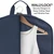 upclose of interior and garment being packed on hanger