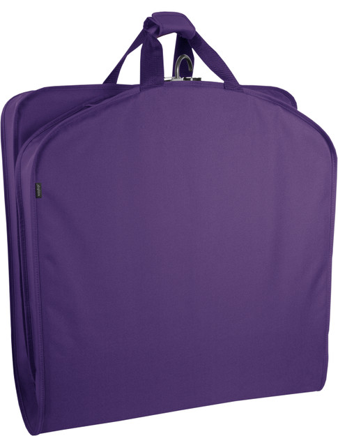 Garment bag folded in half to carry by handles.