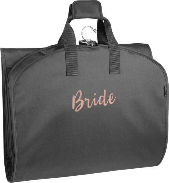 Tri-folded view of garment bag to carry by handles. 'Bride' embroidered in rose thread color on center of bag.