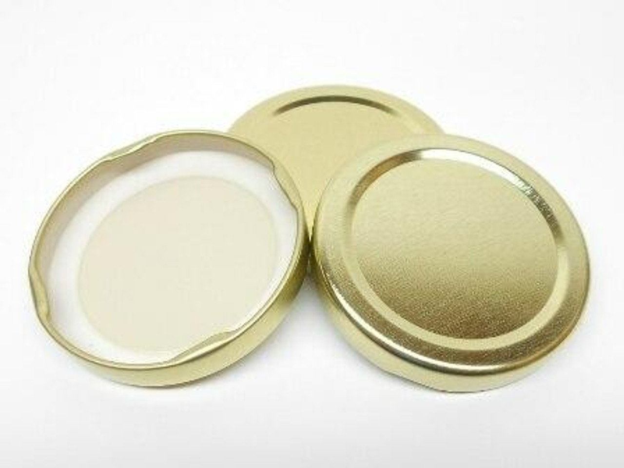 https://cdn11.bigcommerce.com/s-q86nctjasv/images/stencil/1280x1280/products/805/3931/58mm-gold-twist-lug-lids-12-pack-lappesbeesupply__08102.1691028108.jpg?c=1