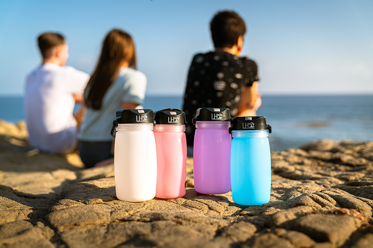 Solar camping lantern with cell charger and container