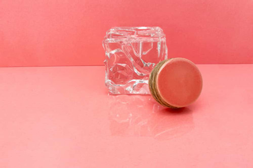 Our coral pink holder keeps your sticky hemp wick nice and neat.