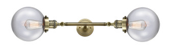 Franklin Restoration Two Light Bath Vanity in Antique Brass (405|208L-AB-G202-8)