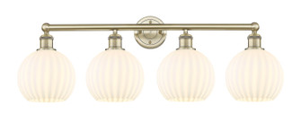 Edison Four Light Bath Vanity in Antique Brass (405|616-4W-AB-G1217-8WV)