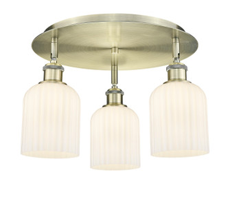 Downtown Urban Three Light Flush Mount in Antique Brass (405|516-3C-AB-G559-5GWH)