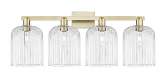 Arcadia Four Light Bath Vanity in Antique Brass (405|716-4W-AB-G559-8CL)