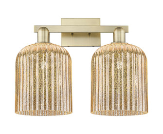 Arcadia Two Light Bath Vanity in Antique Brass (405|716-2W-AB-G559-8ME)
