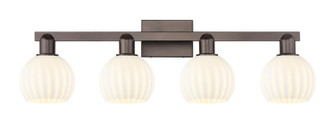 Arcadia Four Light Bath Vanity in Oil Rubbed Bronze (405|716-4W-OB-G1217-6WV)