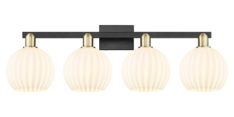 Arcadia Four Light Bath Vanity in Black Antique Brass (405|716-4W-BAB-G1217-8WV)