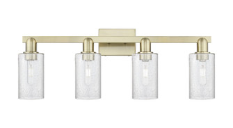 Arcadia Four Light Bath Vanity in Antique Brass (405|716-4W-AB-G804)