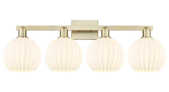 Arcadia Four Light Bath Vanity in Antique Brass (405|716-4W-AB-G1217-8WV)