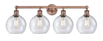 Edison Four Light Bath Vanity in Antique Copper (405|616-4W-AC-G124-8)