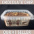 clear plastic lid, clear plastic container with white label and black lettering. chocolate chip flavored peanut butter.