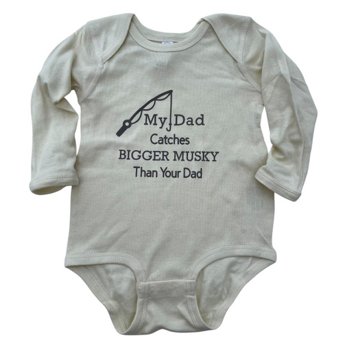 Natural color infant onesie with text ‘My Dad Catches Bigger Musky Than Your Dad’ and fishing rod design