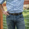 The Galco 1 1/2" Cop Holster Belt modeled on jeans with fenced background Thumbnail Image