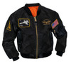 Rothco Kid's Flight Jacket with Patches, black bomber style jacket featuring military-themed patches including fighter pilot insignia, American flag, and aviation badges, with orange lining and gold zipper. Thumbnail Image
