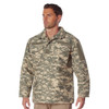Rothco M-65 Field Jacket M65FJ, military-style camouflage jacket worn by a male model. Thumbnail Image