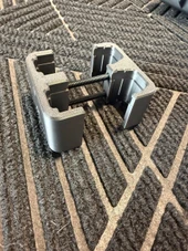 LAPG PMAG Magazine Coupler, a metallic black and gray device used for connecting two magazines together. Thumbnail Image