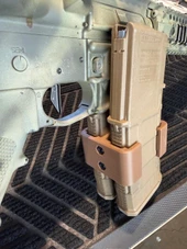 LAPG PMAG Magazine Coupler, tan color magazine coupler attached to two magazines, designed to connect multiple magazines for tactical use. Thumbnail Image