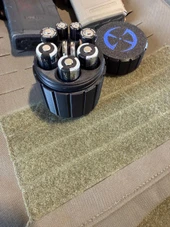 LAPG Tactical Spare Battery Container TDP-RDBATTHOLDER, black cylindrical battery storage container with removable lid, holding multiple batteries. Thumbnail Image
