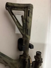 LAPG AR-15 Buffer Tube Wall Mount TDP-ARWM, tactical firearm stock mount attached to a wall, designed for AR-15 buffer tube storage and organization. Thumbnail Image