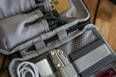 Vertx Urban Ghost Utility Pouch VTX5313, organized tactical gear and accessories in a grey tactical pouch. Thumbnail Image