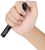 Olight Black I3T PLUS Slim Pocket Light in model hand