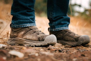 OTB Boots Incline Mid Waterproof Tactical Boot, rugged brown waterproof tactical hiking boots worn outdoors.