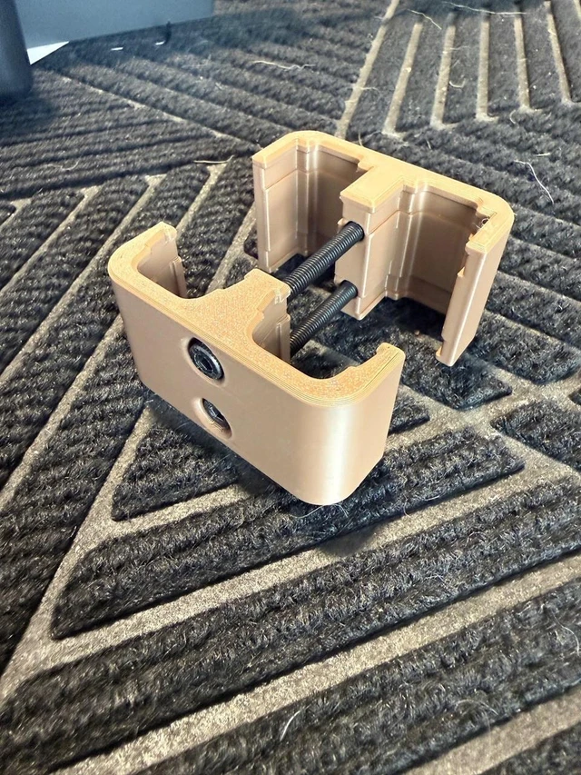 LAPG PMAG Magazine Coupler, tan colored plastic device with screws designed to join multiple magazines together.