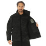 Rothco Midnight Camo Special Ops Soft Shell Jacket MCSOSSJ, a man wearing a black camo tactical jacket with multiple pockets, zippers, and a high collar.