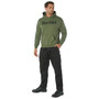 Rothco Marines Pullover Hooded Sweatshirt MPHS, image of a man wearing a green pull-over hoodie with 'Marines' written in black on the front, paired with black tactical pants and boots.