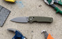 Kershaw Bel Air XL Olive 3V Folding Knife 6110OL 087171073484, showing a folding knife with a green handle and silver blade on a textured surface surrounded by tools.