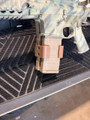 LAPG PMAG Magazine Coupler, tan polymer magazine coupler attached to a rifle magazine.