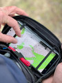 Kitanica Flip Admin Pouch 112-KN, close-up of the black tactical pouch with a smartphone inside and a person adjusting the zipper.