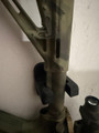 LAPG AR-15 Buffer Tube Wall Mount, firearm wall mount for AR-15 buffer tubes with sturdy metal construction and adjustable hooks for secure storage.