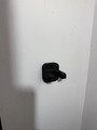 LAPG AR-15 Buffer Tube Wall Mount TDP-ARWM, black mount attached to a white textured wall.