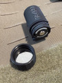 LAPG Picatinny Rail Battery Storage Container - 2 Pack, black plastic cylindrical keychain designed to hold batteries with ribbed exterior for grip.