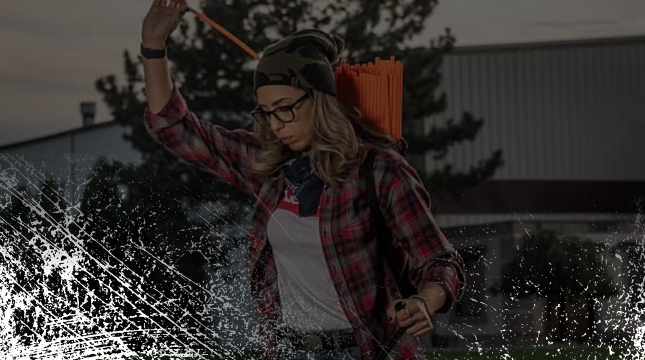 Plow Right Marking Stakes - Woman Installing Snow Stakes for Plowing 