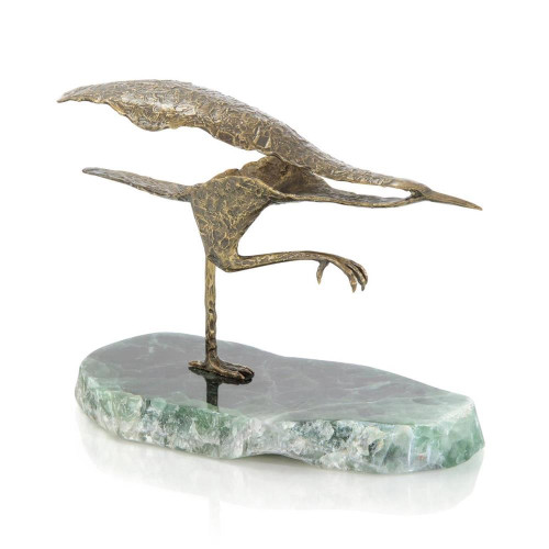 Avian sculpture on stone III